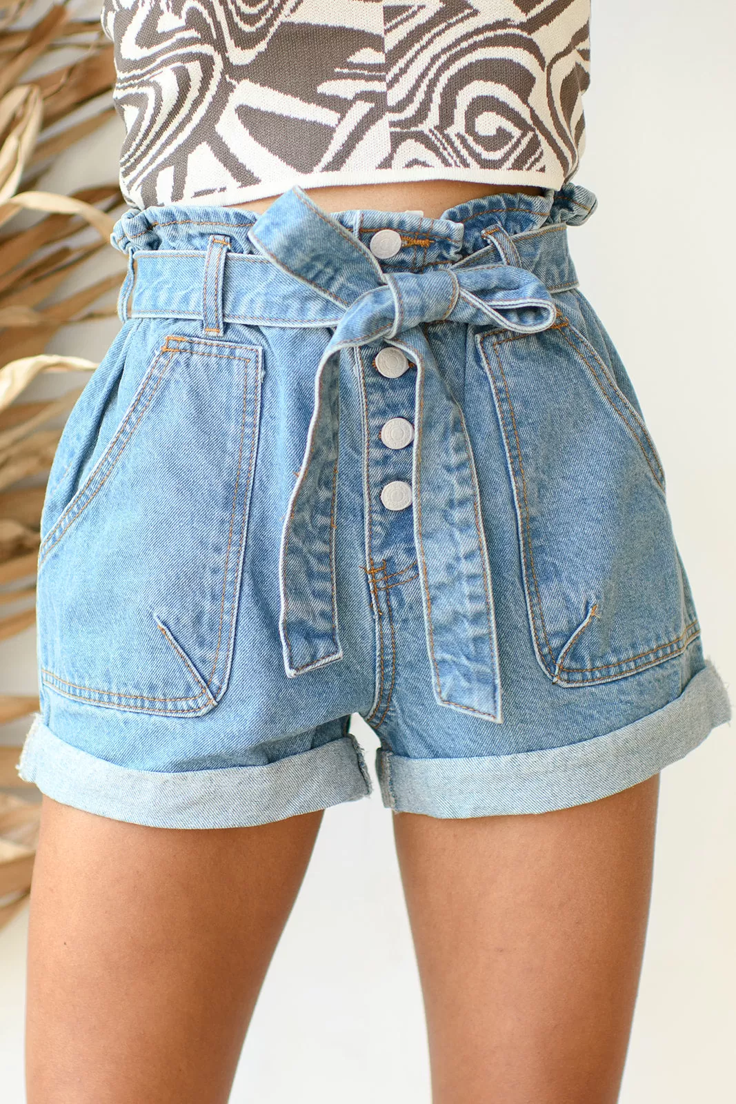 belted paper bag jean shorts