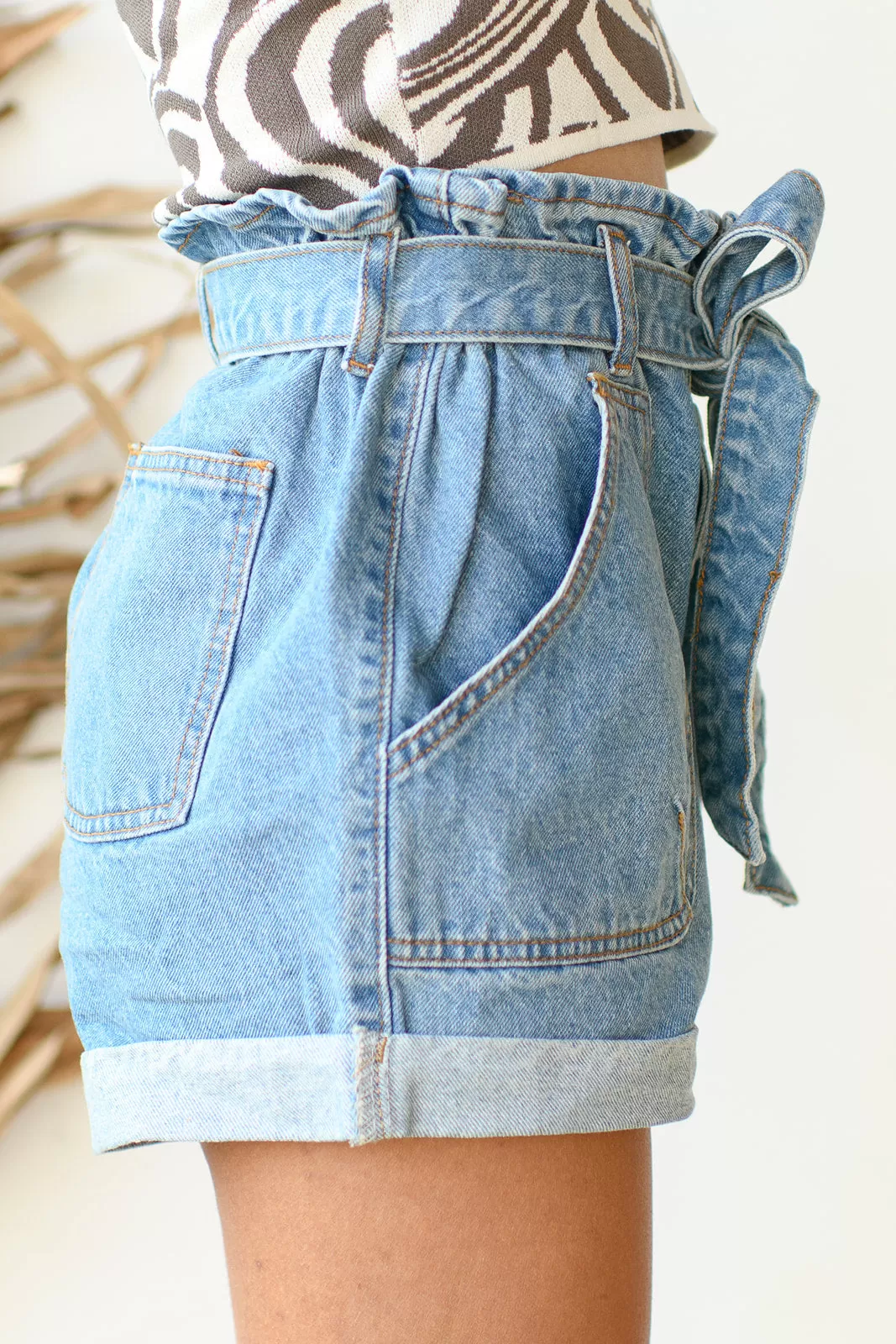 belted paper bag jean shorts